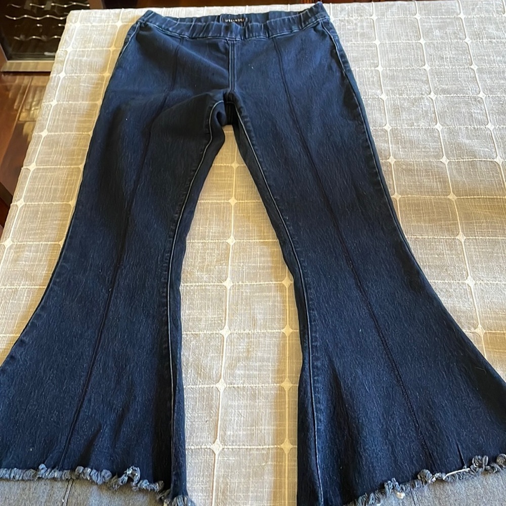 Juliette center seams pull on, raw edged bell bottom jeans